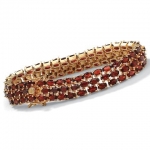 PalmBeach Jewelry 50193 27.50 TCW Oval Cut Genuine Garnet 14k Yellow Gold-Plated Triple-Row Tennis Bracelet 8 1/2